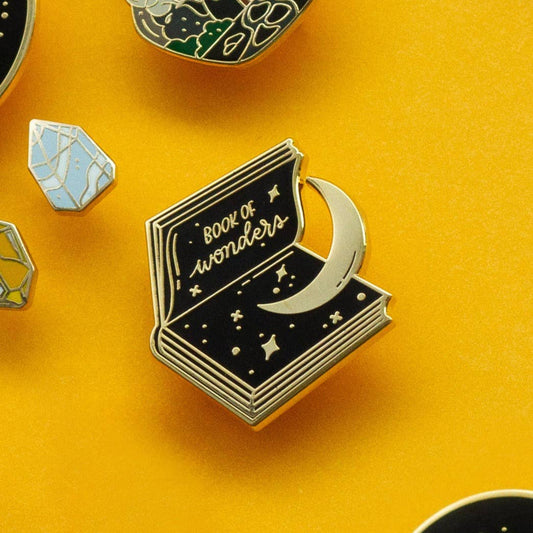 Book of Wonders Enamel Pin